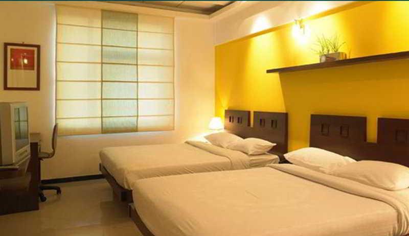 Tricolour Ξενοδοχείο Μπανγκαλόρ Δωμάτιο φωτογραφία